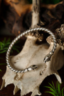 Viking bracelet with weasel heads, silvered bronze