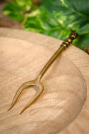 Medieval fork with girls head
