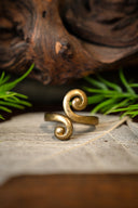Celtic ring with stylised spiral motif, bronze