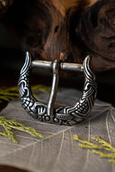 Borre-Jellinge style buckle gripping-beast, silvered
