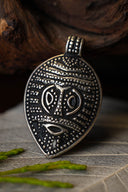 Viking Odin mask amulet Gotland, silvered bronze