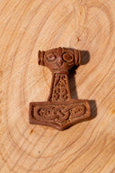 Mjölnir pendant with face, wood