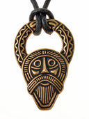 Woden head amulet Kingsworthy, 7th century, bronze