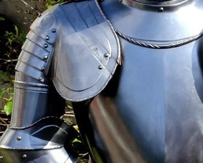 Arm armour parts: pauldrons, vambraces and couters