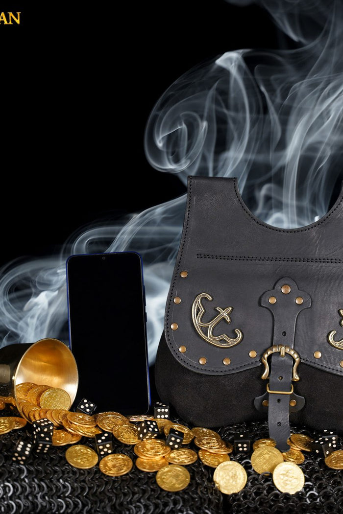 Late medieval kidney purse with fittings, black, 14th-15th centuries