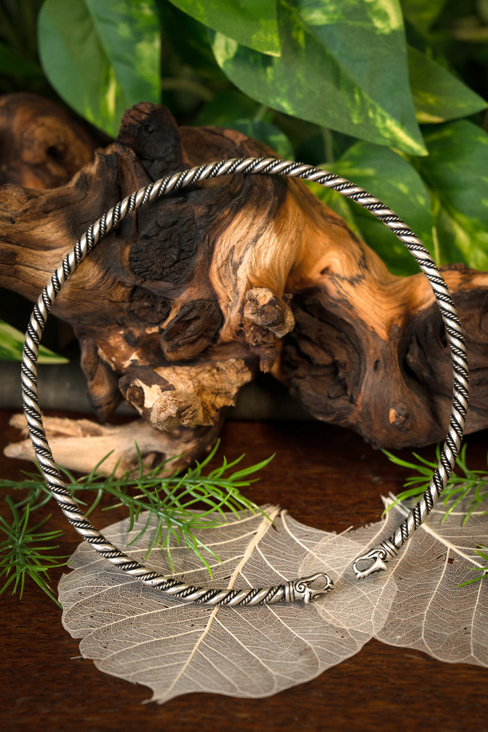 Viking torque with wolf heads, silvered bronze