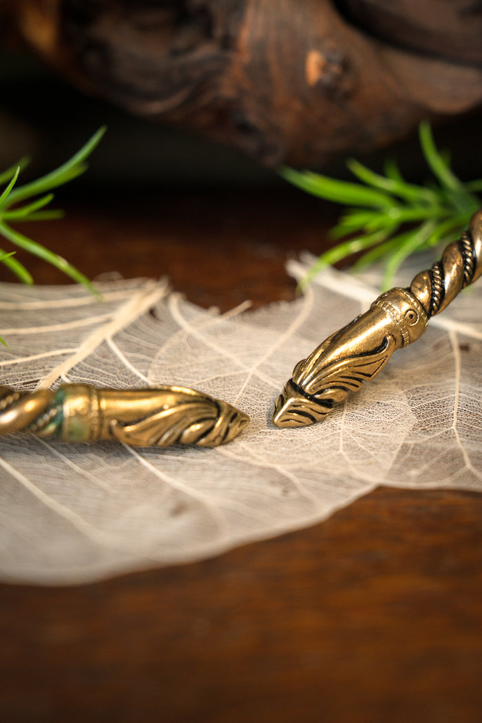 Viking torque with raven heads, bronze