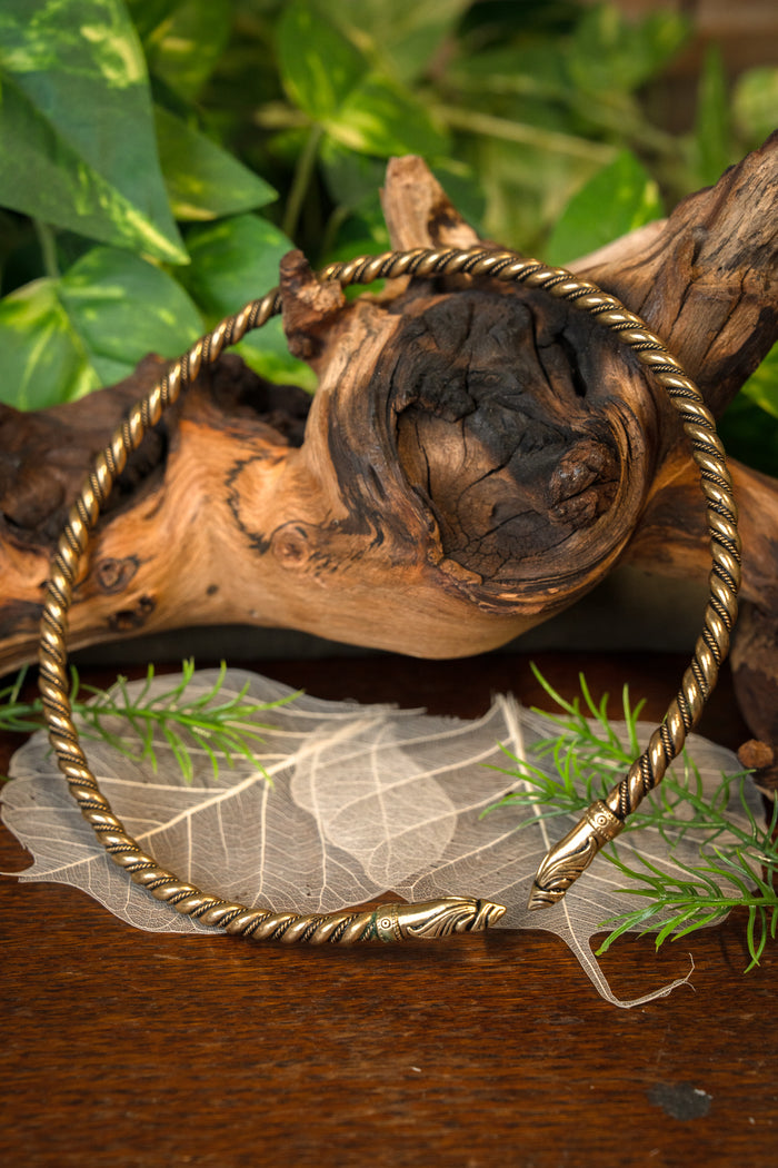 Viking torque with raven heads, bronze