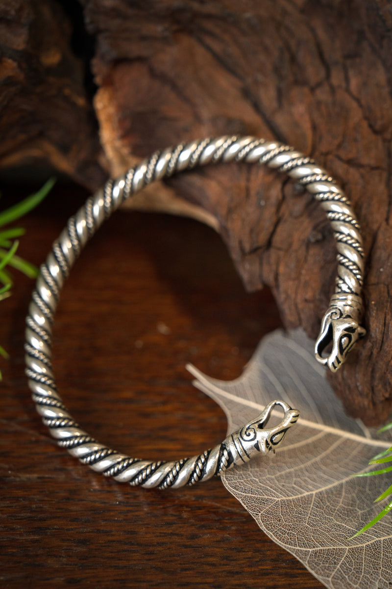 Viking bracelet with wolf heads, silvered bronze