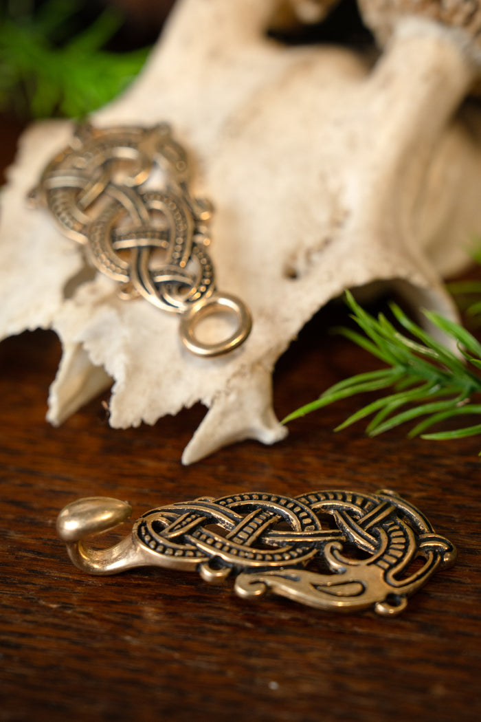 Cloak clasp with Midgard Serpent, bronze