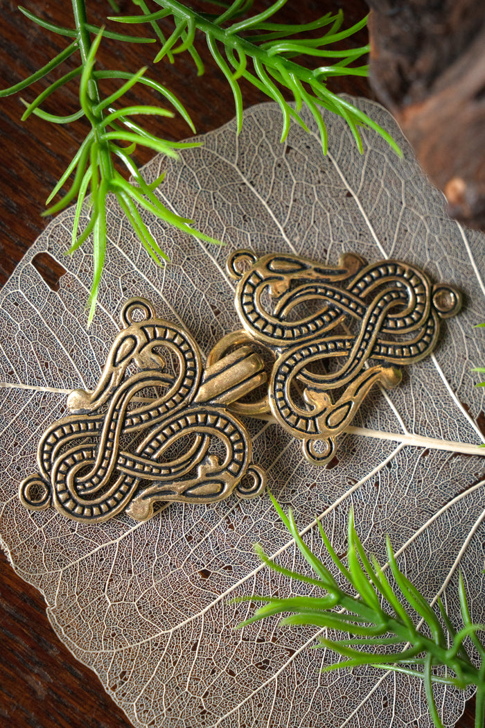 Cloak clasp Midgard snake Urnes style, bronze