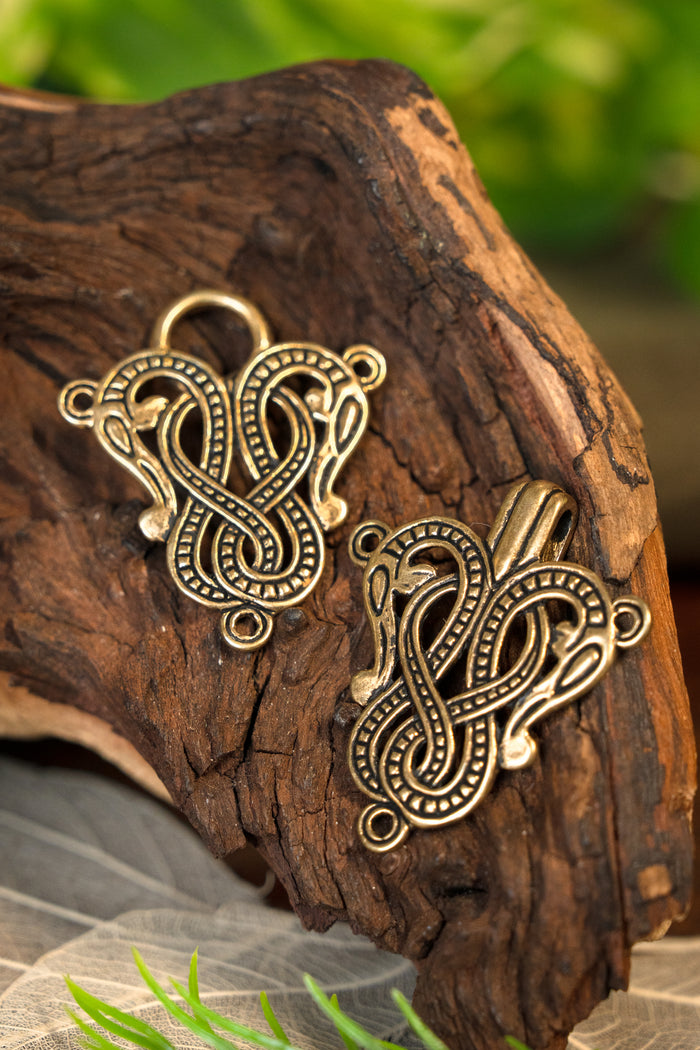Cloak clasp Midgard snake Urnes style, bronze