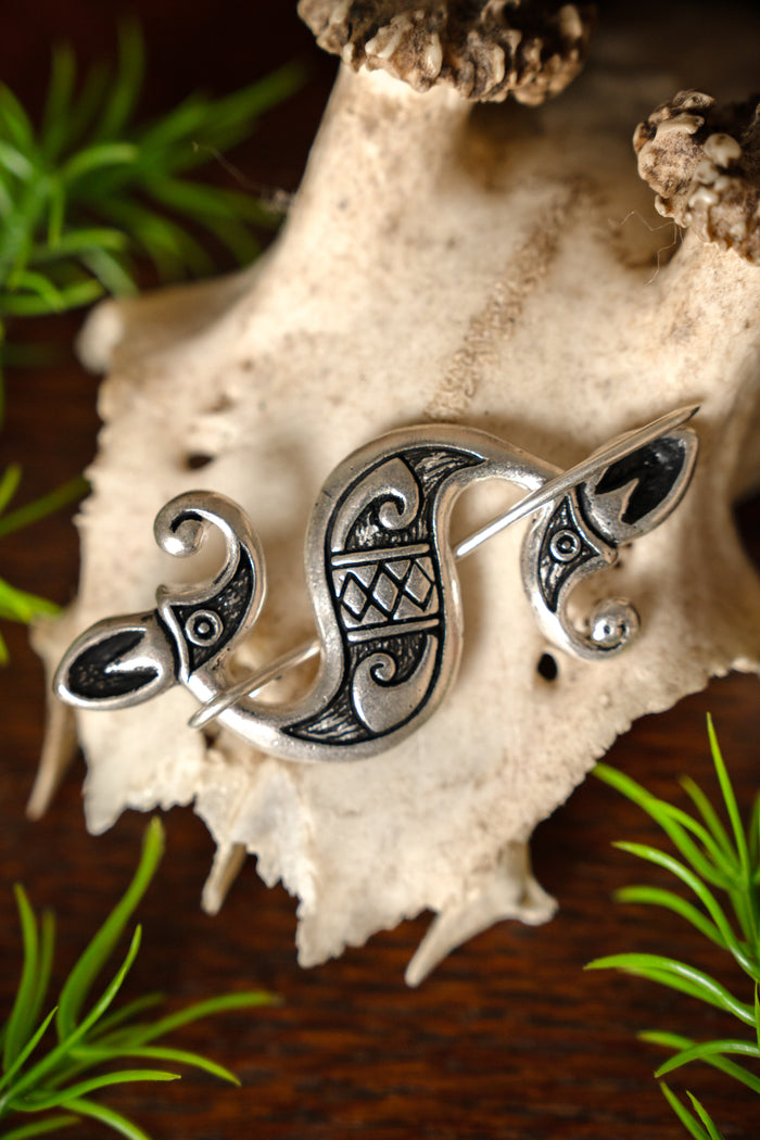 Celtic-Roman sea horse fibula, silvered bronze