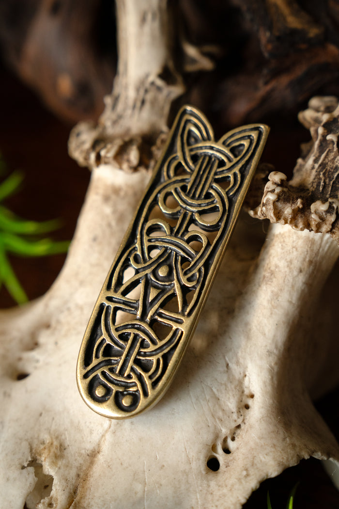 Jorvik belt end, brass colour