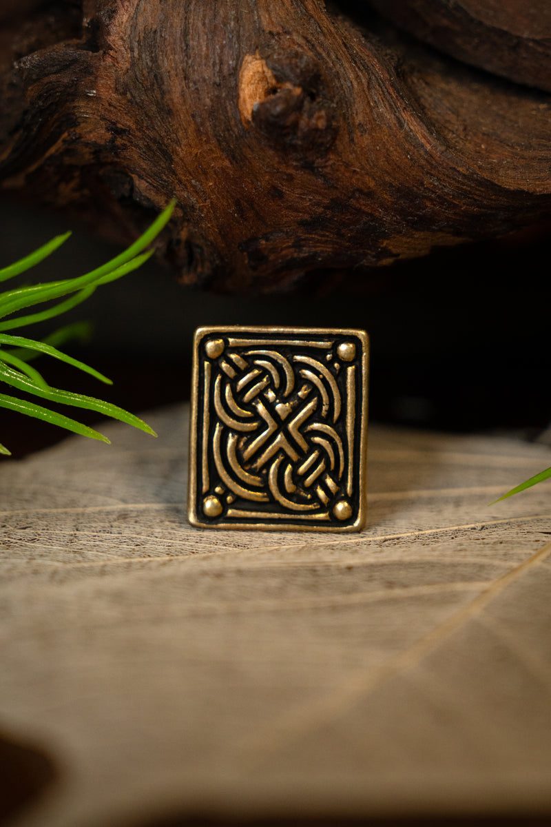 Viking belt fitting with knot motif, Birka