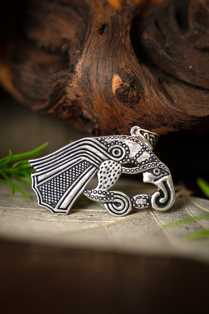 Germanic raven amulet, silvered bronze