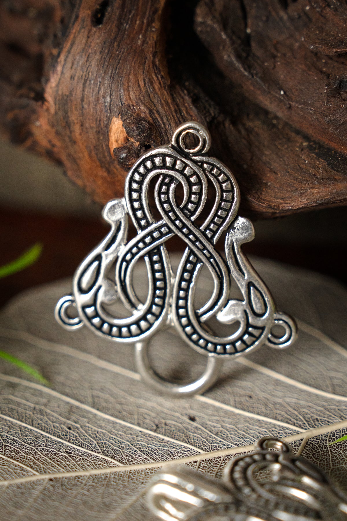 Cloak clasp Midgard snake Urnes style, silvered bronze