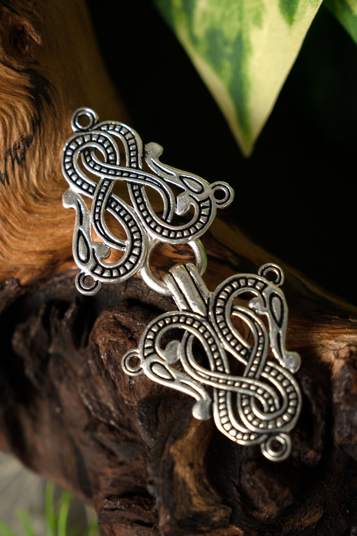 Cloak clasp Midgard snake Urnes style, silvered bronze