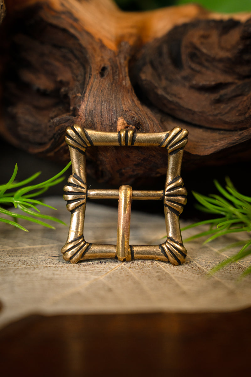Belt buckle with shell motif, 16th century, bronze