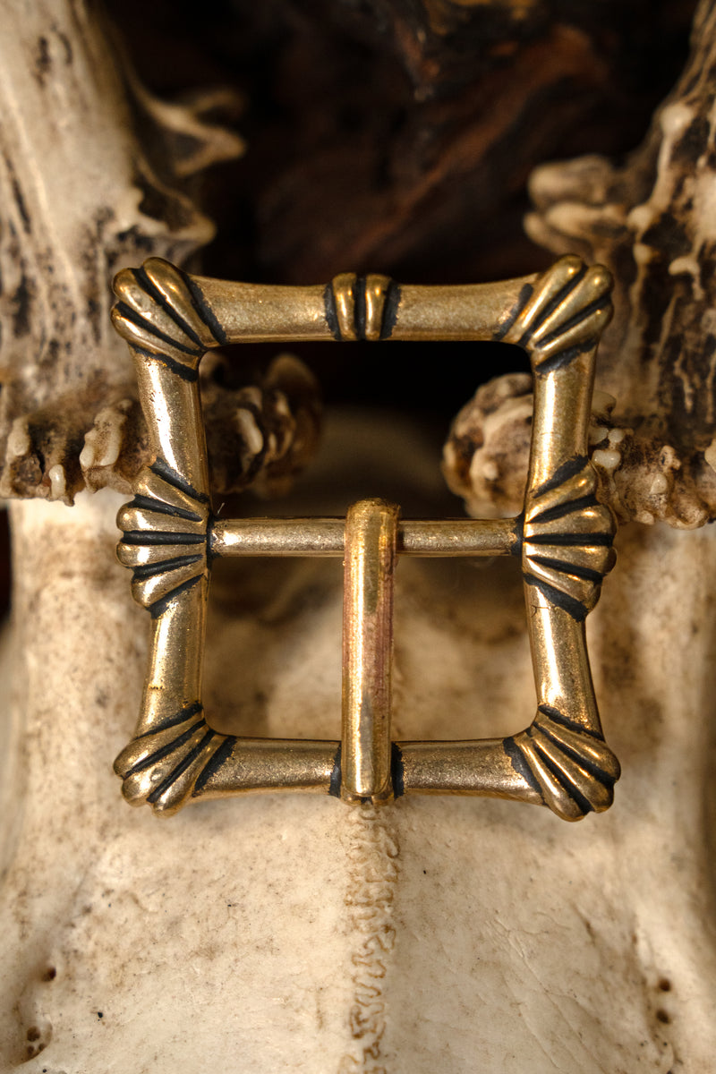 Belt buckle with shell motif, 16th century, bronze