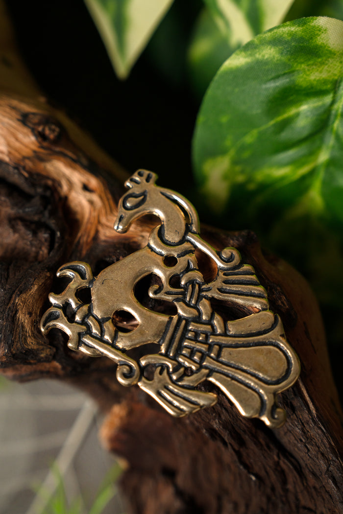 Viking peacock brooch, bronze