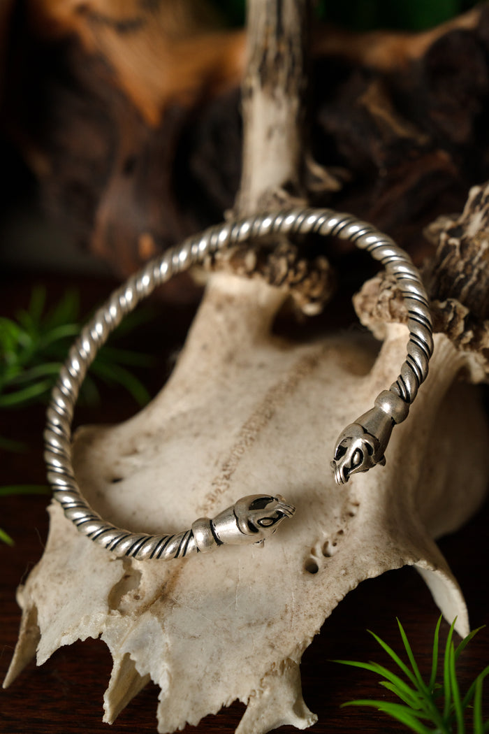 Viking bracelet with weasel heads, silvered bronze