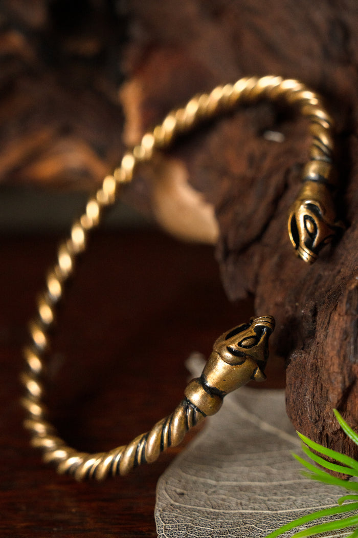 Viking bracelet with weasel heads, bronze