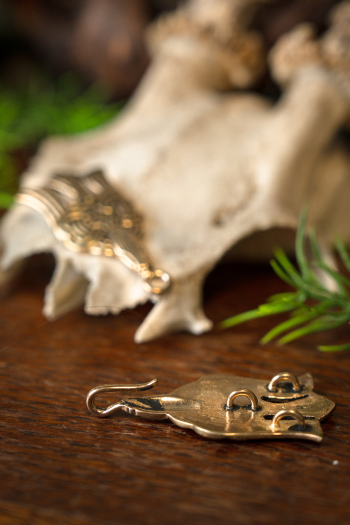 Rusvik cloak clasp, bronze
