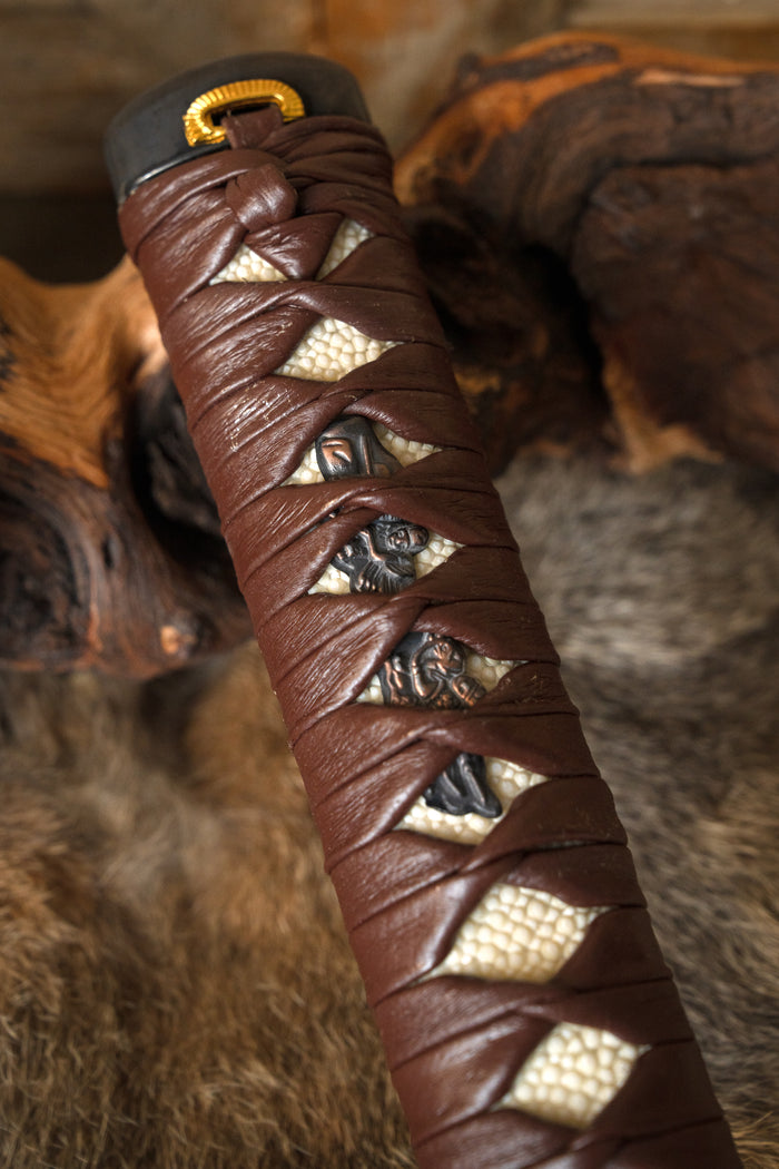 Samurai sword grip with leather wrapping