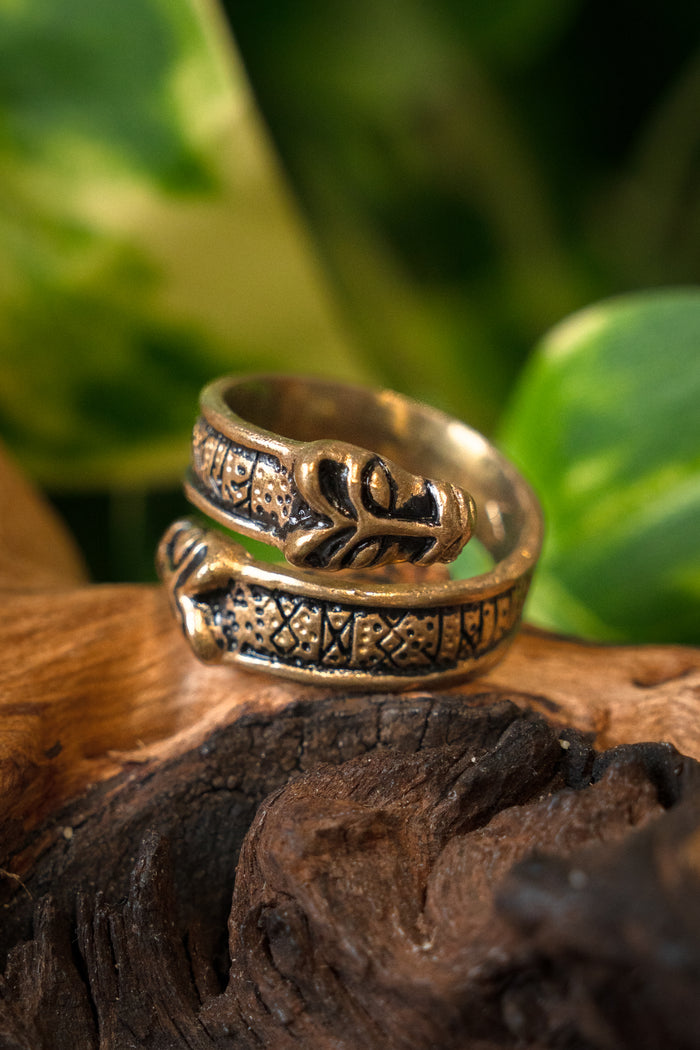 Viking rune ring with wolf heads, bronze