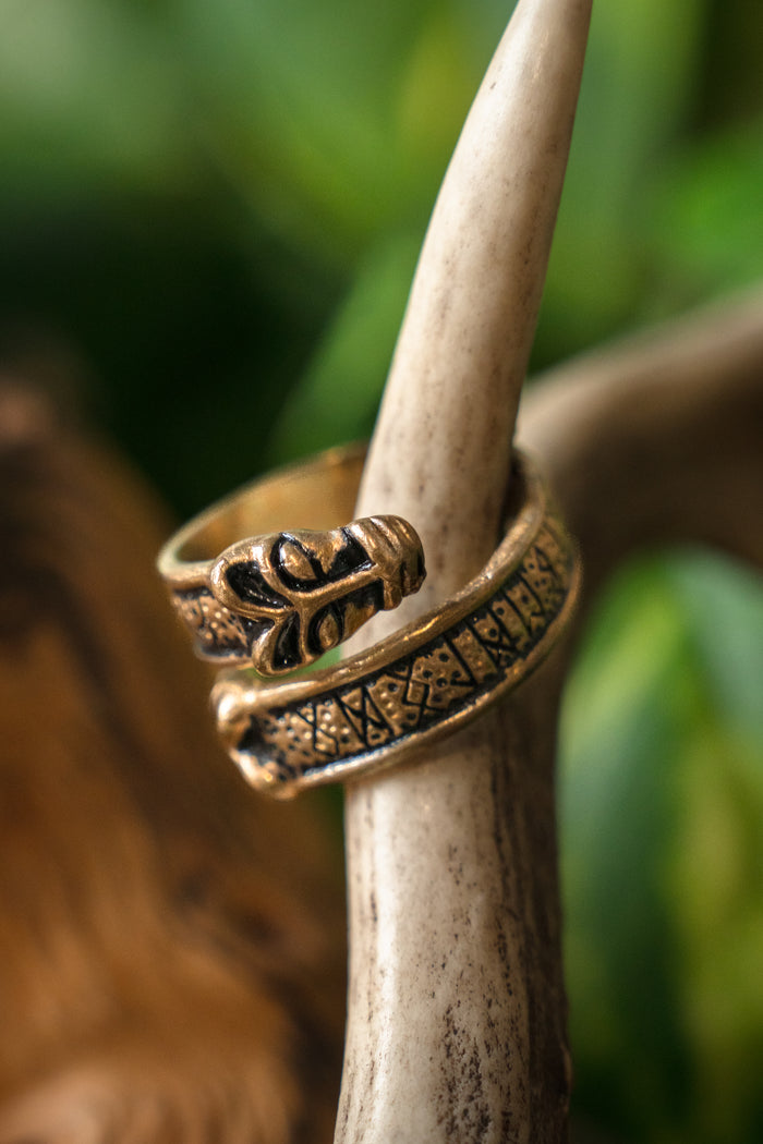 Viking rune ring with wolf heads, bronze