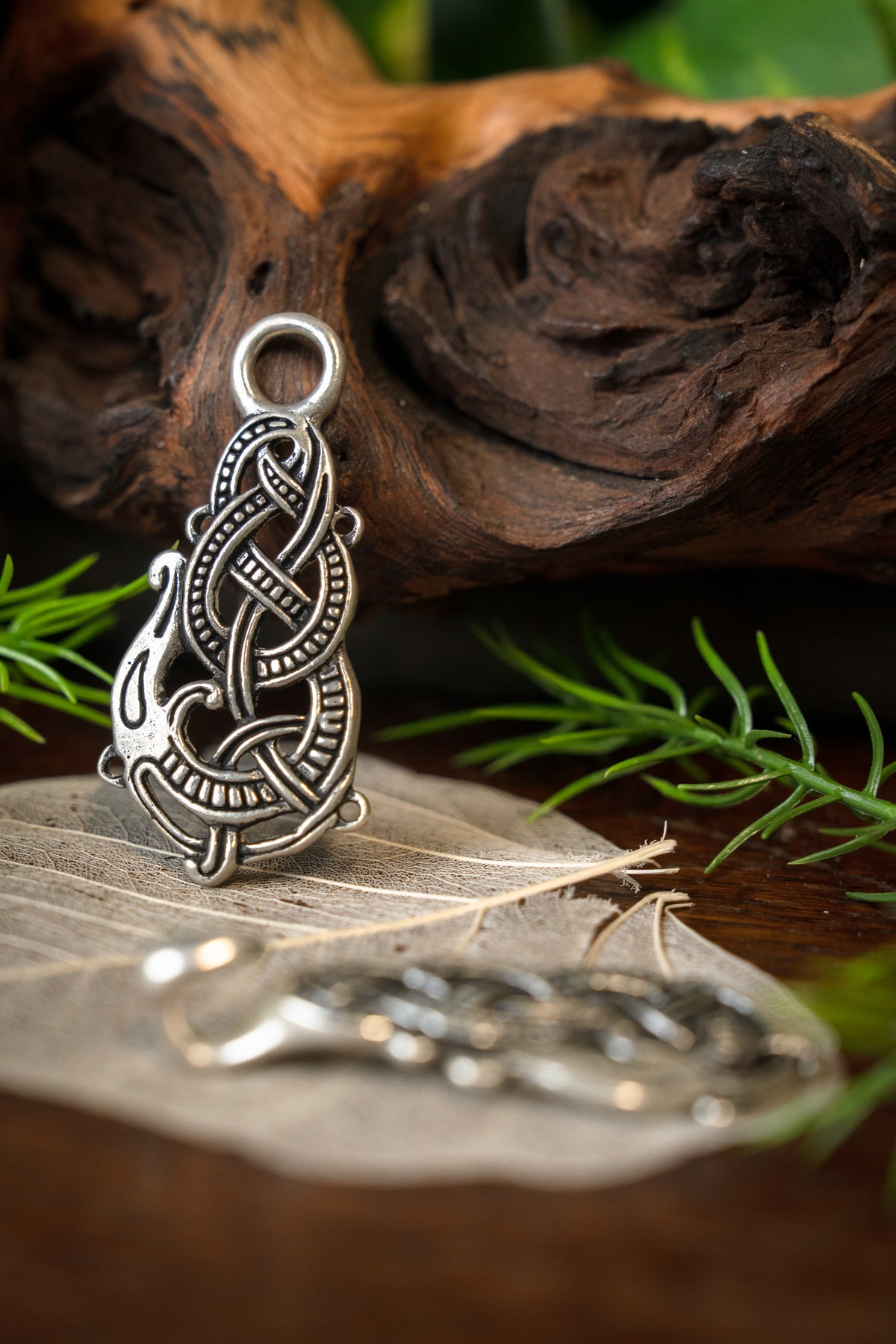 Silvered cloak clasp with Midgard snake, silvered bronze