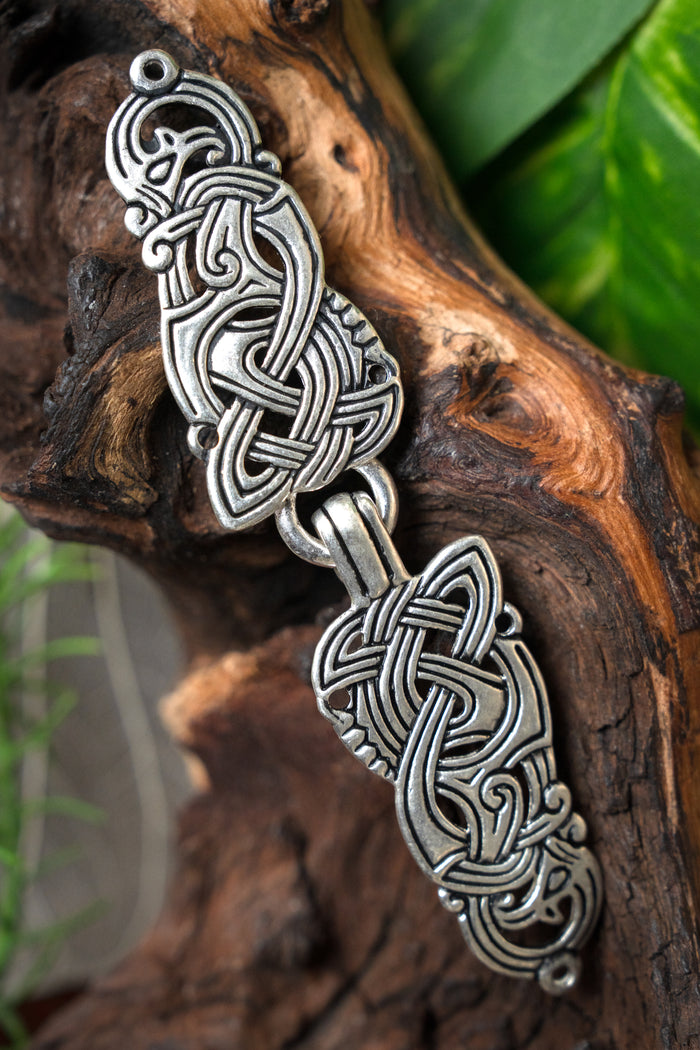Viking cloak clasp with dragons, silvered bronze