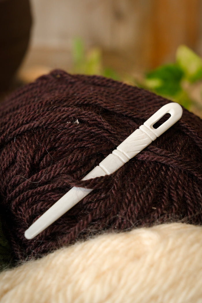 Decorated needle for needle binding