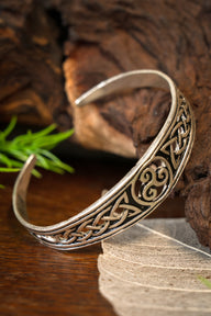 Narrow Celtic bracelet with trisquelion, silvered bronze