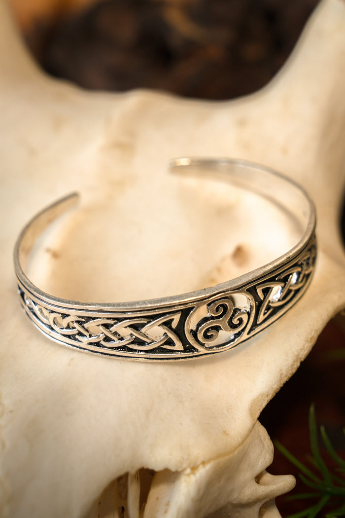 Narrow Celtic bracelet with trisquelion, silvered bronze