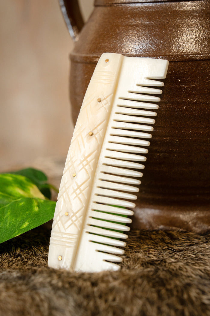 Bone Viking comb with stylised motifs