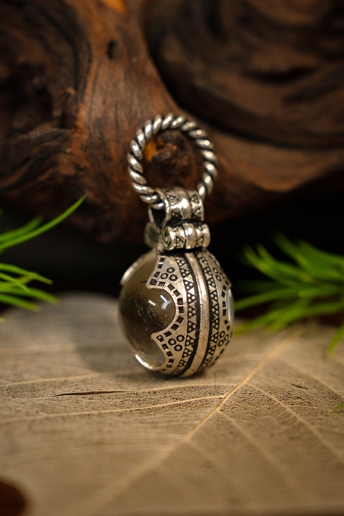 Viking völva mountain crystal amulet Gotland, S, silvered bronze
