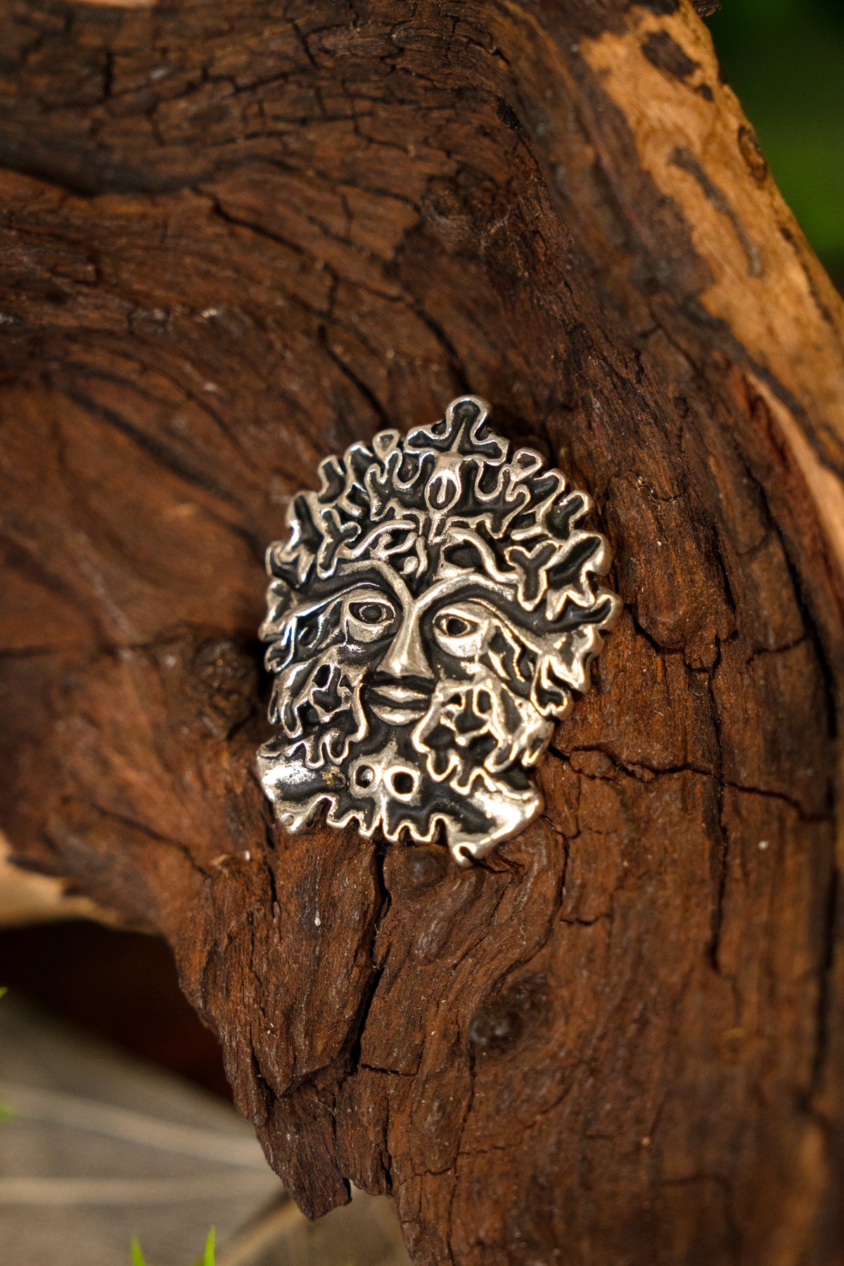 The Green Man amulet, silvered bronze
