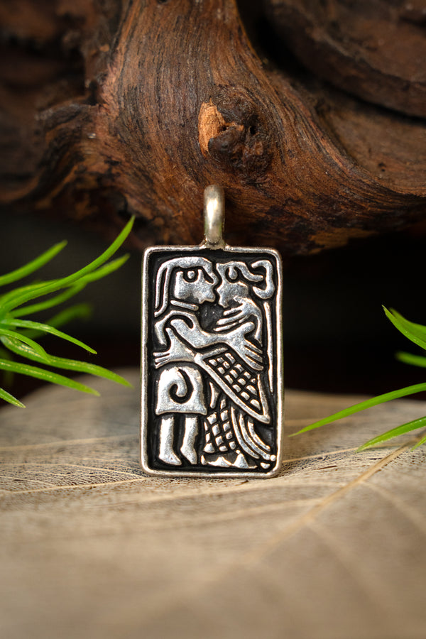 Vendel gold foils, love amulet, silvered bronze