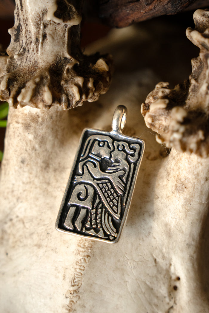 Vendel gold foils, love amulet, silvered bronze