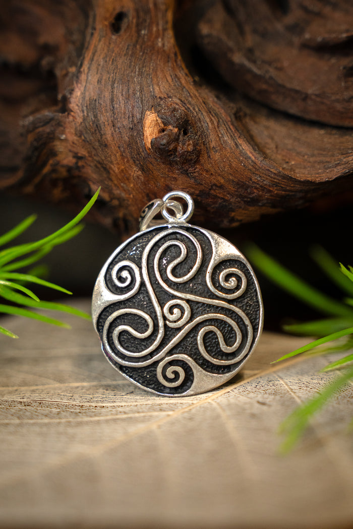 Amulet Celtic trisquelion, silvered bronze