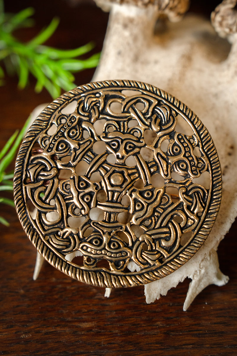 Borrestijl schijffibula, brons