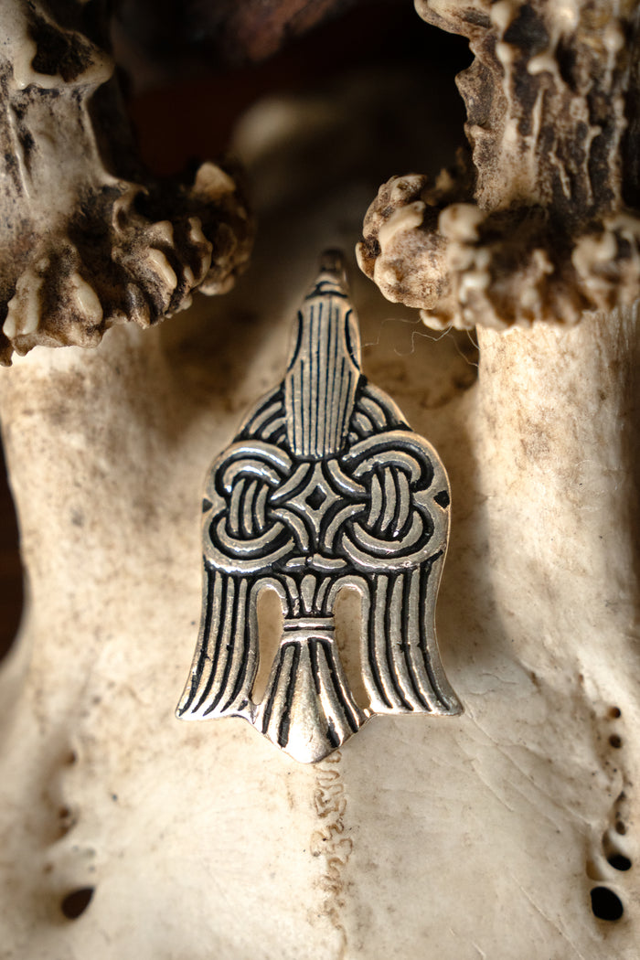 10th century Viking raven pendant, silvered bronze