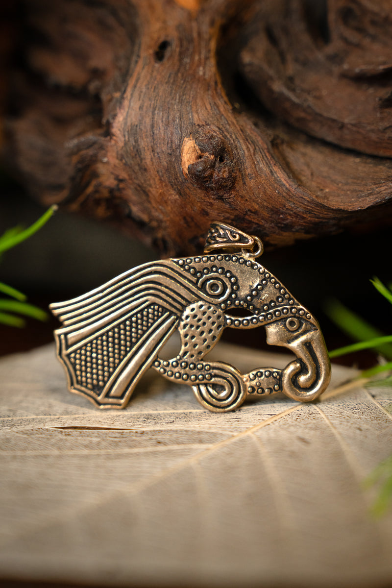 Germanic raven amulet, bronze