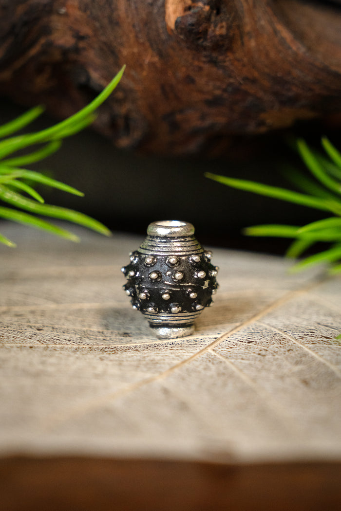 9th-10th century Viking beard bead, silvered bronze