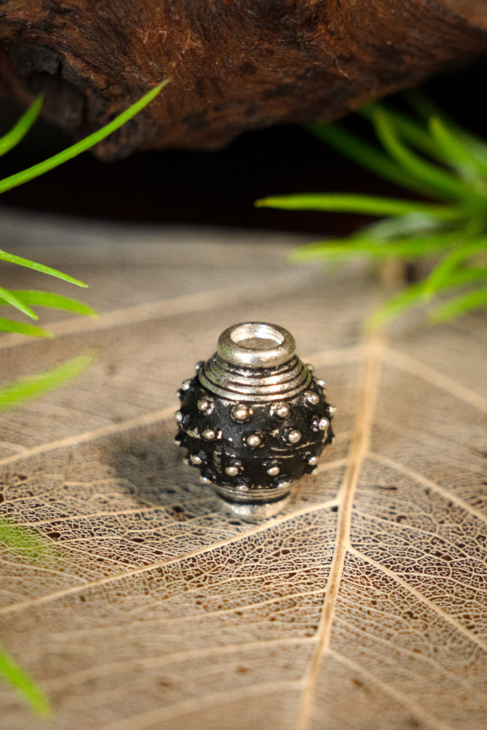 9th-10th century Viking beard bead, silvered bronze