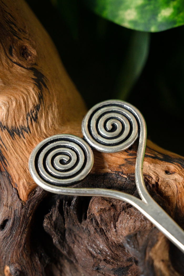 Bronze Age hairpin with spirals, silvered bronze