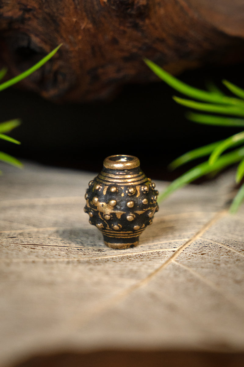 9th-10th century Viking beard bead, bronze