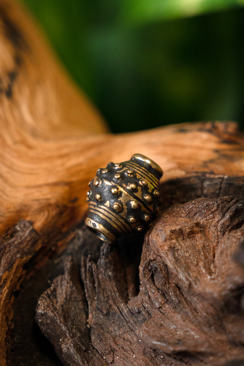 9th-10th century Viking beard bead, bronze